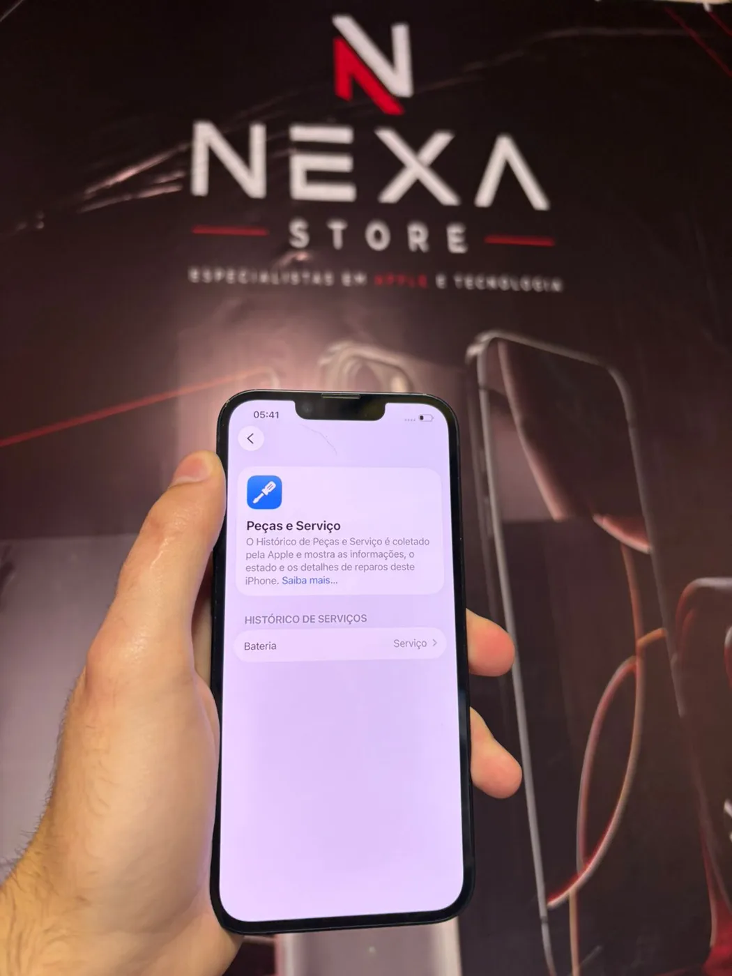 iPhone 14 — tela Histórico de Peças e Serviço mostrando serviço realizado na bateria